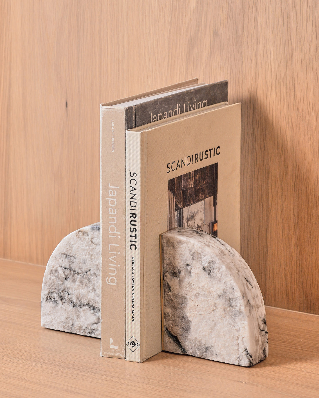 White marble bookends with antique brass overlay