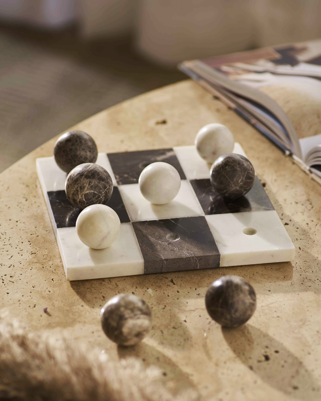 Handcrafted marble tic tac toe board with natural stone playing pieces