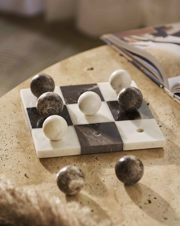 Handcrafted marble tic tac toe board with natural stone playing pieces